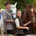 Young people horseriding